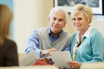 senior couple speaking with FA